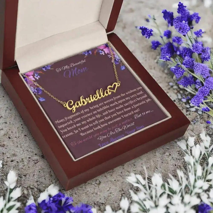 gold name heart necklace in mahogany box angled left