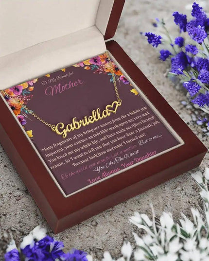 gold name heart necklace in mahogany box angled left