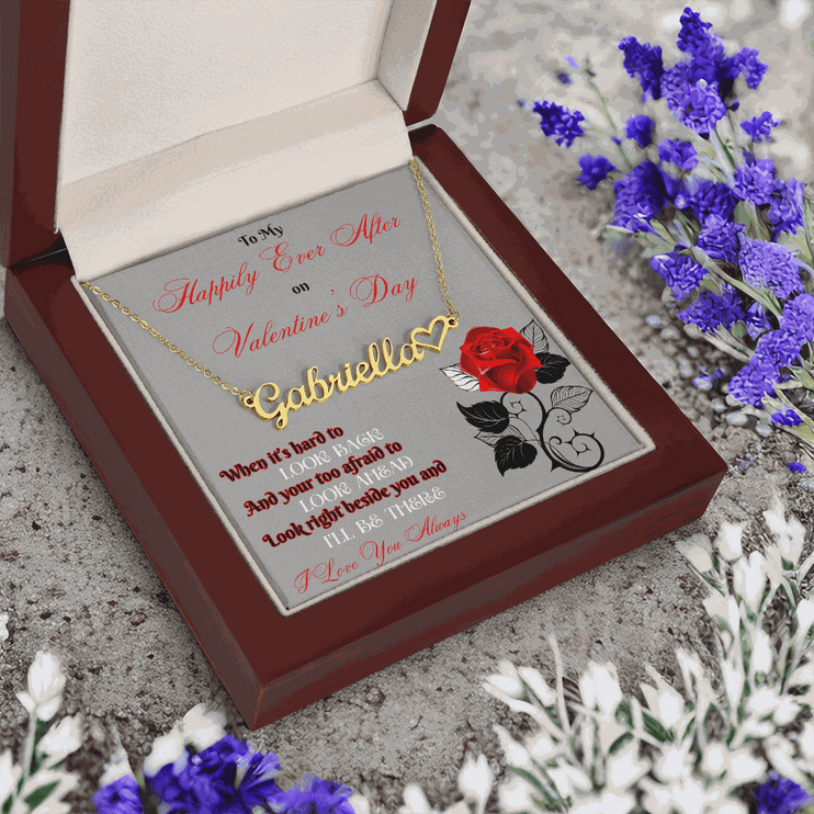 gold name heart necklace in mahogany box with flowers