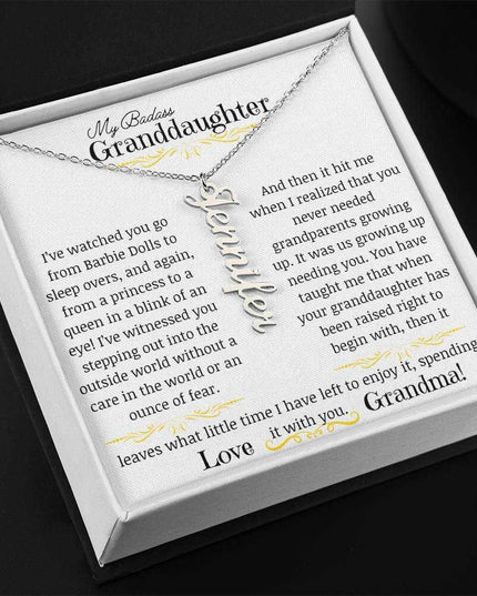 a polished stainless-steel vertical name necklace angled left