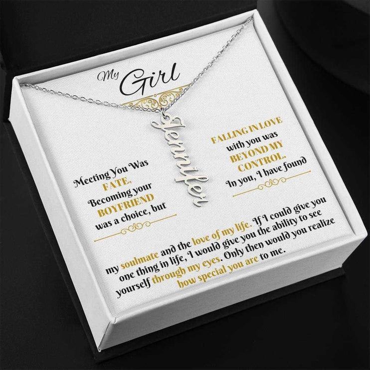 polished stainless-steel vertical name necklace in a soft box angled left