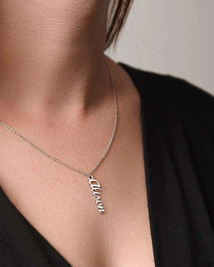 polished stainless-steel vertical name necklace on model's neck