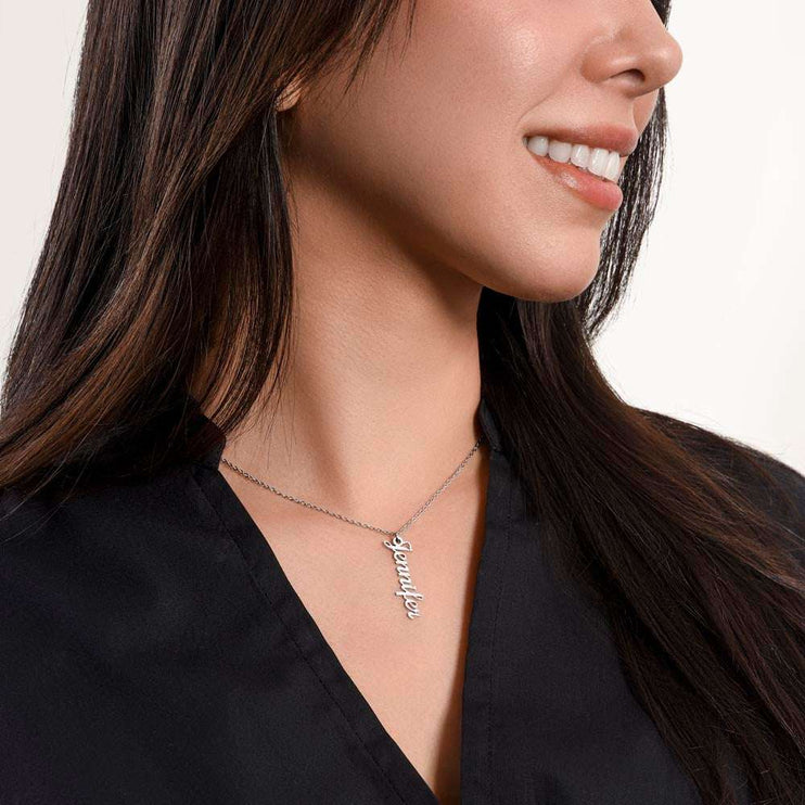 polished stainless-steel vertical name necklace on model's neck