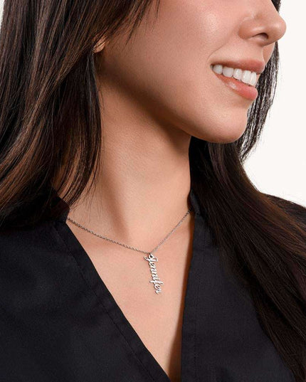 polished stainless-steel vertical name necklace on a model's neck