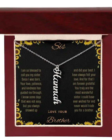 Vertical Name Necklace with a polished stainless-steel charm on a to sis from brother greeting card in a mahogany box