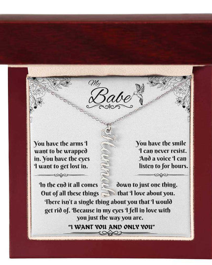 polished stainless-steel vertical name necklace in a luxury box up close