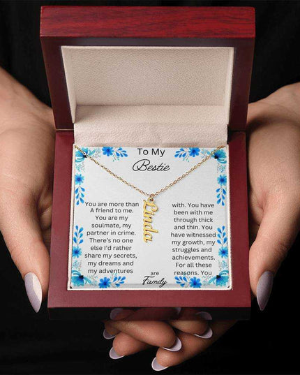 vertical name necklace in a mahogany box with to my bestie message card and gold variant charm