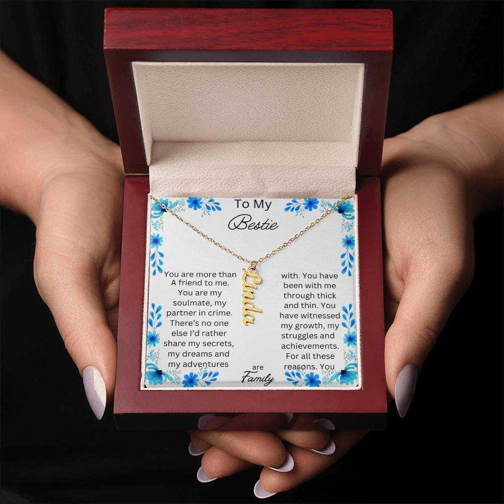 vertical name necklace in a mahogany box with to my bestie message card and gold variant charm