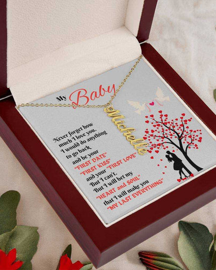 gold vertical name necklace in luxury box angled left 