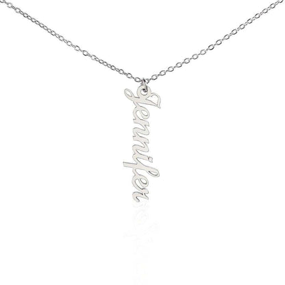 a polished stainless steel vertical name necklace hanging