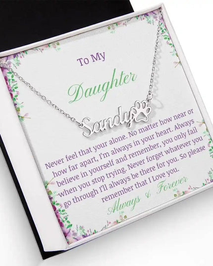 A polished stainless-steel pet name paw print necklace angled left