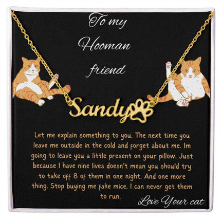 Pet Name Paw Print Necklace with a yellow gold finish variant on a to my hooman greeting card with a up close view