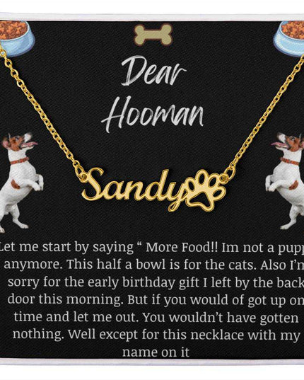 Pet Name Paw Print Necklace with a yellow gold variant on a Dear Human greeting card with up close view