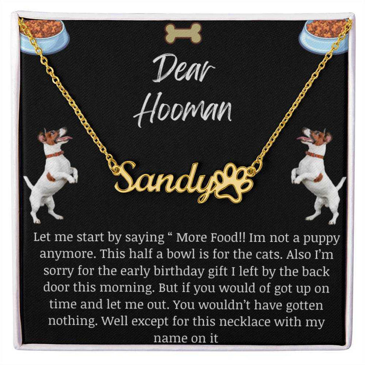 Pet Name Paw Print Necklace with a yellow gold variant on a Dear Human greeting card with up close view