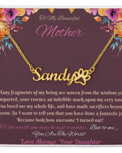 gold paw print pet name necklace in soft box