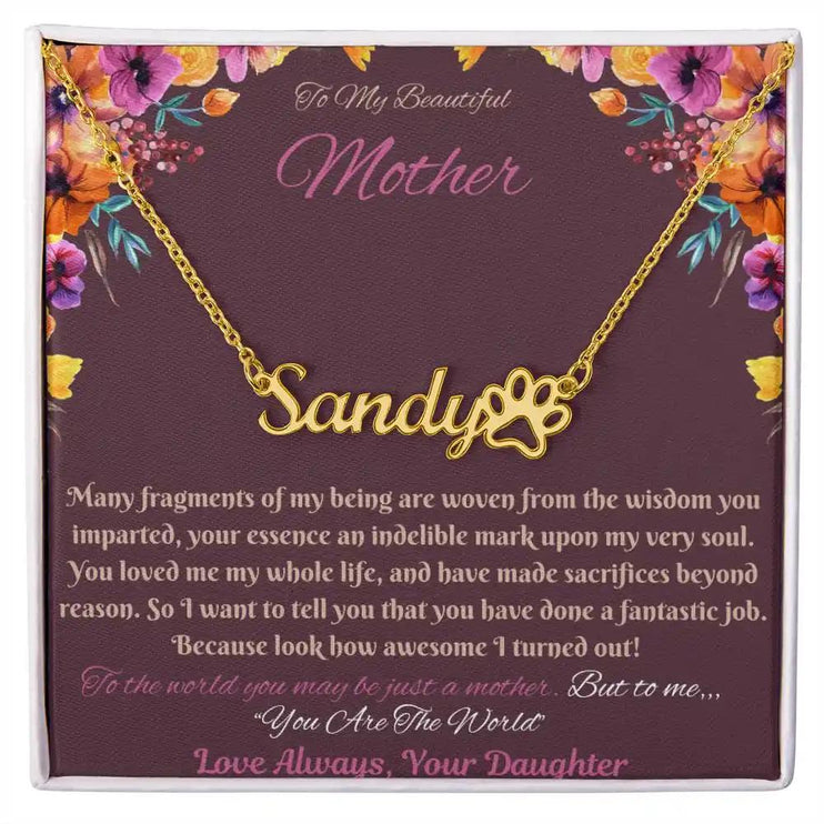 gold paw print pet name necklace in soft box