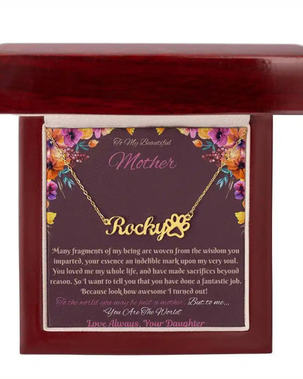 gold paw print pet name necklace in mahogany box