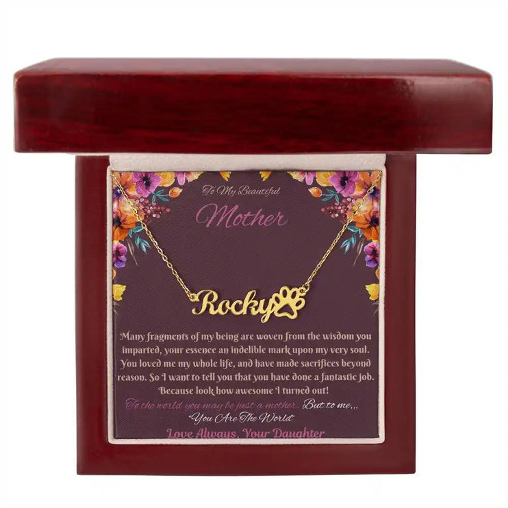 gold paw print pet name necklace in mahogany box