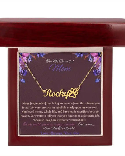 gold paw print pet name necklace in mahogany box