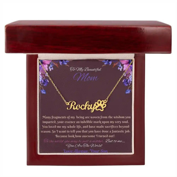 gold paw print pet name necklace in mahogany box
