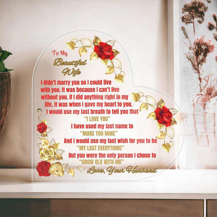 acrylic heart plaque on a shelf