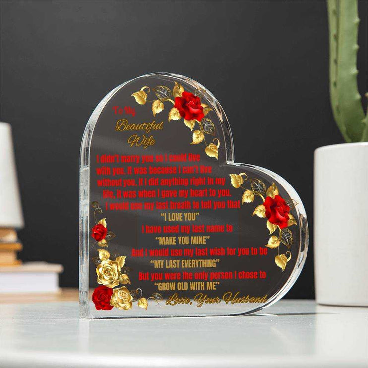 acrylic heart plaque on a white kitchen counter