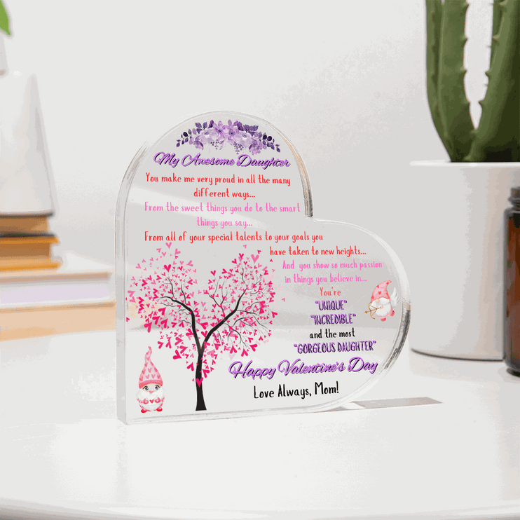 acrylic heart plaque on a kitchen counter with plants