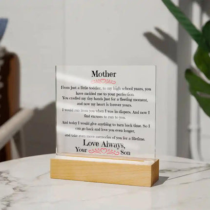 a acrylic square plaque on a table