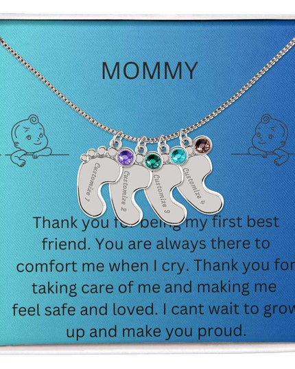 a 4 charm polished silver baby feet birthstone necklace in a two-tone box