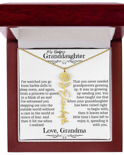 a yellow gold flower name necklace for January in mahogany box