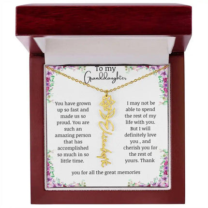 a yellow gold finish March birth flower name necklace in a mahogany box.