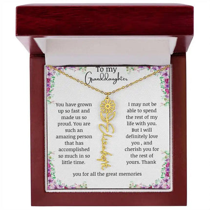 a yellow gold finish April birth flower name necklace in a mahogany box.