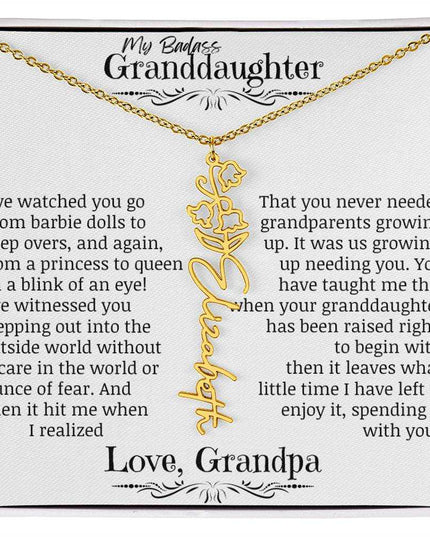 a yellow gold flower name necklace.