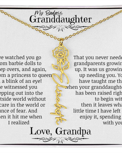 a yellow gold flower name necklace.