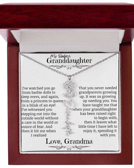 a polished stainless steel flower name necklace for June in mahogany box