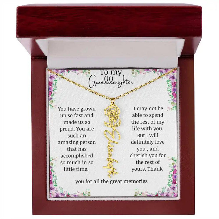 a yellow gold finish June birth flower name necklace in a mahogany box.