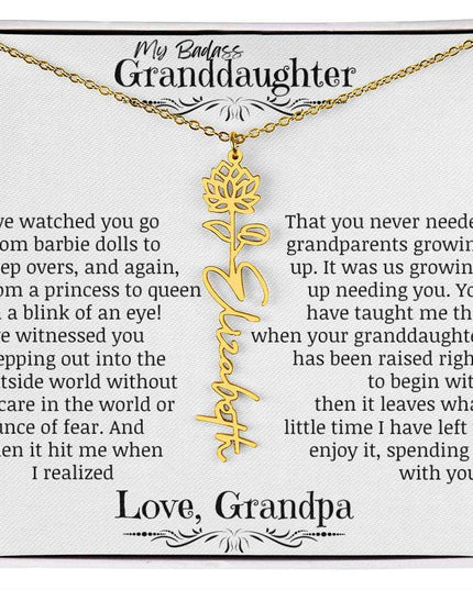 a yellow gold flower name necklace.