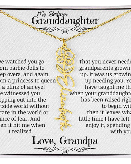 a yellow gold flower name necklace.
