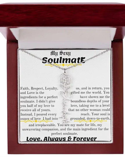 a birth flower name necklace in polished stainless steel for August in a mahogany box.