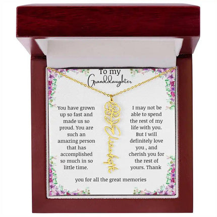 a yellow gold finish August birth flower name necklace in a mahogany box.