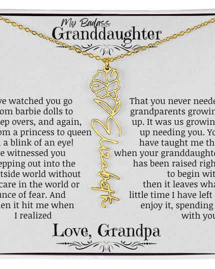 a yellow gold flower name necklace.