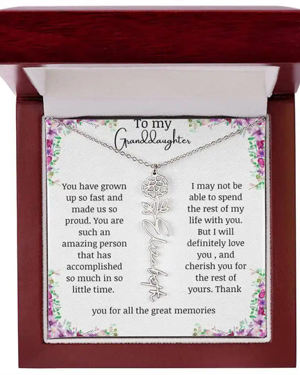 a polished stainless-steel October birth flower name necklace in a mahogany box.