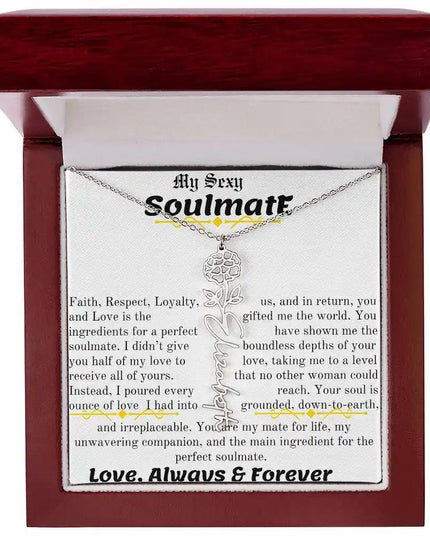 a birth flower name necklace in polished stainless steel for October in a mahogany box.