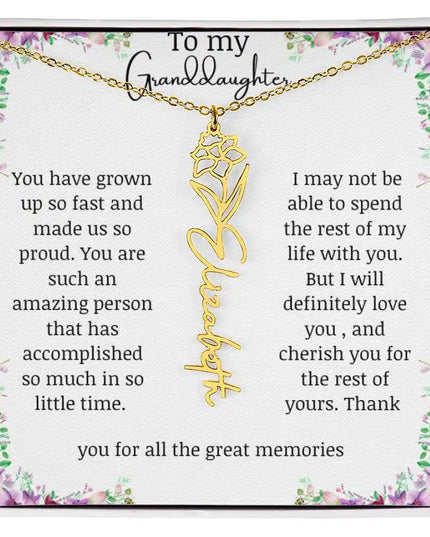 a yellow gold finish December birth flower name necklace.