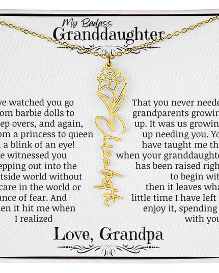 a yellow gold flower name necklace.