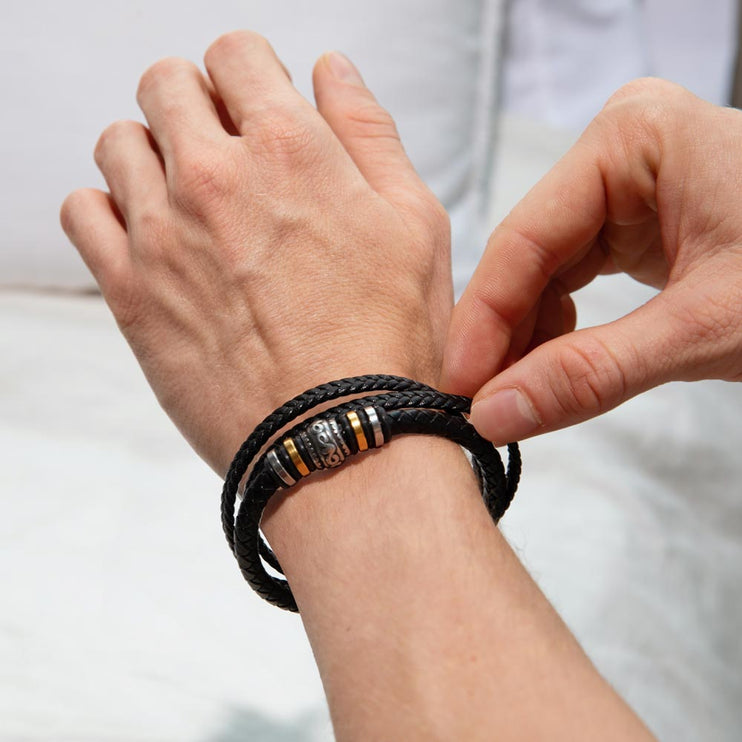 Men's Love You Forever Bracelet with magnetic locking on a model's hand.