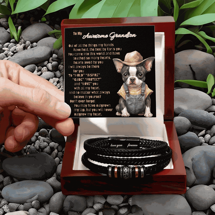 love you forever bracelet in a mahogany box on a bed of rocks