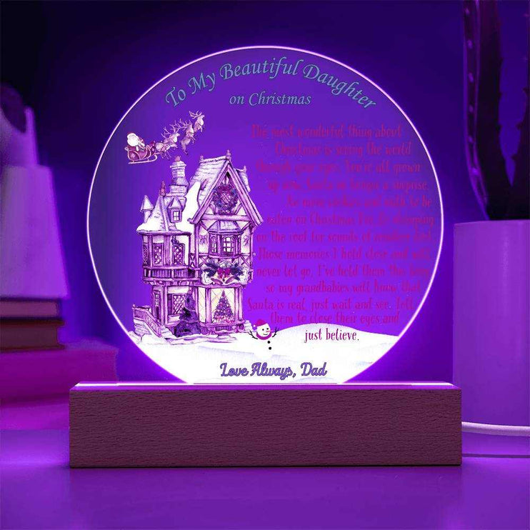 just believe 120v acrylic round plaque on a table with purple light