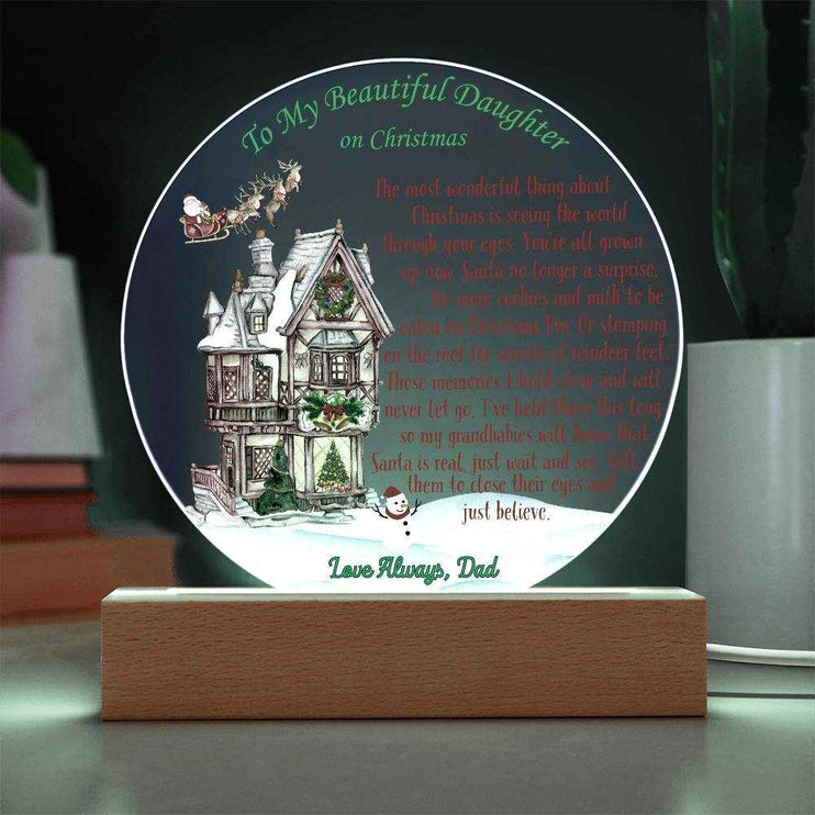 just believe 120v acrylic round plaque on a table with clear light