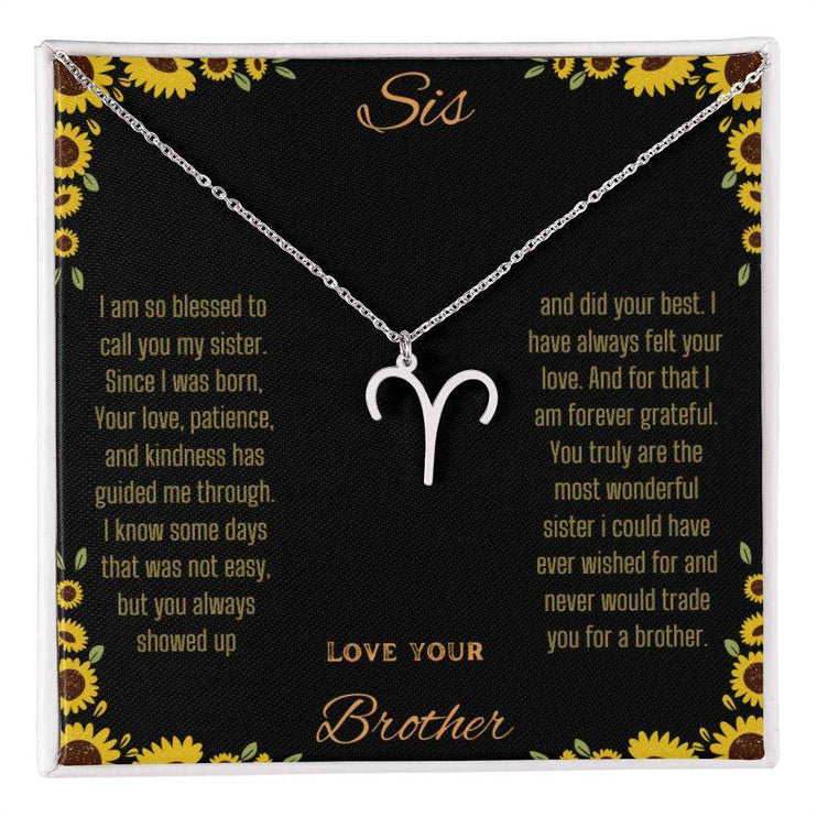 Zodiac Symbol Necklace with a polished stainless-steel Aries charm on a to sis from brother greeting card inside a two-tone box